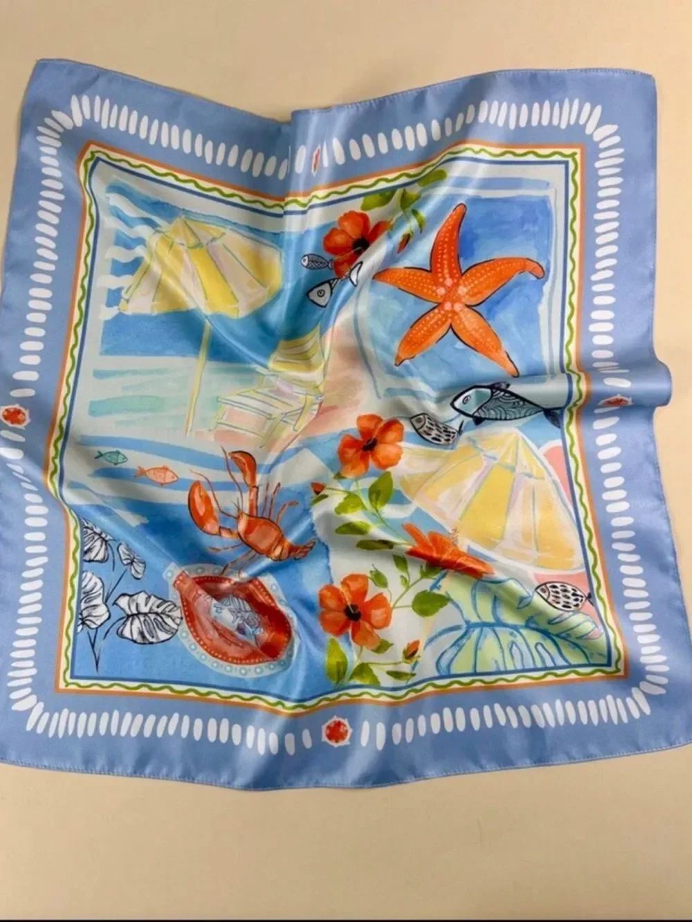 Beach-Themed Blue Scarf with Orange Accents R 508